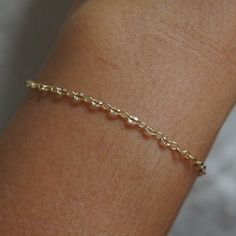 One of our newest chains! Every other link has a starburst imprinted✨ Perfect for layering! Lightweight for comfort and every day wear 14kt gold filled Adjustable 14k Gold-filled Satellite Chain Bracelet, Gold 14k Gold Bracelets With Satellite Chain, Delicate 14k Gold Bracelet With Adjustable Chain, Delicate 14k Gold-filled Yellow Gold Bracelets, Delicate 14k Yellow Gold Filled Bracelets, Delicate Gold-plated Bracelet Tarnish Resistant, Dainty 14k Gold Filled Jubilee Bracelet, Delicate Gold-plated Tarnish-resistant Bracelet, Delicate Yellow Gold Everyday Bracelet