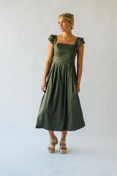 This playful, quirky dress exudes confidence with its ruffle sleeves and flattering midi length. Perfect for adding some fun to your everyday wardrobe, its olive color adds a touch of personality to any outfit. Get ready to turn heads and feel fabulous in the Whitmire Ruffle Sleeve Midi Dress! self/lining: 100% polyester Fabric Care Guide Here Sizing & Fit Measurements are approximate and taken while laying flat across the front. Not doubled. small: bust = "; waist = "; length = " medium: bust = "; waist = "; length = " large: bust = "; waist = "; length = " Inclusive Try-on Video Midi Dress With Ruffle Sleeves For Brunch, Flutter Sleeve Midi Dress For Brunch, Solid Color Midi Dress With Flutter Sleeves For Brunch, Khaki Knee-length Midi Dress For Summer, Green Fitted Maxi Dress With Flutter Sleeves, Fitted Flutter Sleeve Midi Dress For Day Out, Fitted Midi Dress With Flutter Sleeve For Day Out, Fitted Olive Maxi Dress For Spring, Green Midi Dress With Flutter Sleeves