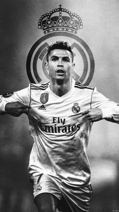 a soccer player with his arms stretched out in front of him and the crown on top of his head