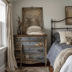 a bedroom with an old dresser and bed