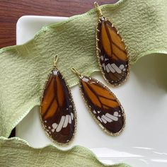 The price is for 2 pcs . Size about: 45x18 mm This are real butterfly wings charms made with clear resin. You can use for made own style Jewelry ,as a gift so cool! Each piece is truly one of a kind. All of my butterflies are ethically sourced. Every butterfly has lived a full life so no wing is so perfect. Taxidermy Jewelry, Real Butterfly Wings, Real Butterfly, Full Life, Spring Earrings, Clear Resin, Butterfly Wings, Necklace Handmade, Style Jewelry