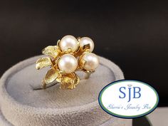 Previously Loved 🥰 Not New ⚪⚪ Vintage Pearl Ring ⚪⚪ Built in all Glowing 14k Yellow Gold ✨️ featuring a fantastic Flower 🌼 Statement Ring Design. Prong set with Four (4) Shimmering Genuine Pearl Gemstones ⚪️⚪️⚪️⚪️ measuring in at approximately 6.5mm each. This AMAZING Vintage Pearl Flower Ring is a Beautiful Statement on its own and a Showstopper with your Stackable  collection a FABULOUS Vintage Treasure 🎁 for any Jewelry occasion.🥰 ️Pearls are an official June Birthstone. ️Weight 10.3 gram Elegant Yellow Gold Flower Ring For Anniversary, Formal White Gold Flower Ring In 14k, Formal 14k White Gold Flower Ring, White Cluster Ring Stamped 14k For Anniversary, 14k Gold Rings With Aaa Quality For Anniversary, High Quality 14k Gold Rings For Anniversary, Aaa Quality 14k Gold Rings For Anniversary, Classic Cluster Flower Ring For Formal Occasions, Yellow Gold Flower Ring With 17 Jewels For Anniversary