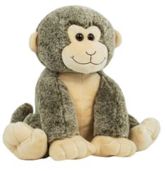 a stuffed monkey sitting on the ground