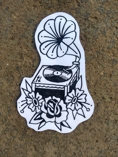 a sticker with an image of a stove and flowers on the side of it