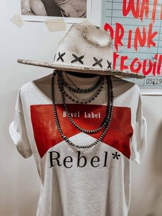 Our Rebel Soul Tshirt/dress Is *The* Thing. We Know It's Not Always Easy To Find The Perfect Festival Get-up, So We Want To Make It a Bit Easier. This Comfy 'N' Fitted 100% Cotton T-shirt Or Oversized Tee Dress Is Ready For Your Head-banging At Stagecoach Festival, Coachella, Bonnaroo, Or Any Other Big-name Music Extravaganza. Trust Us, When You Show Up In This Outfit You'll Get *Cheers* Wherever You Go! To Make Sure You Look And *Feel* Good, Make Sure To Check The Size Chart – Then You Can Rock Stagecoach Festival, Ashley White, Bohemian Boutique, Grey Paint, Cowgirl Western, Coastal Cowgirl, Dress Hats, Off Shoulder Tops, Oversized Tee