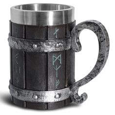 a metal and wood beer mug with arrows on the side, in front of a white background