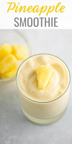 pineapple smoothie in a small glass bowl with a bite taken out of it