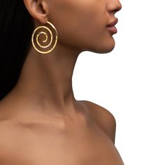 Spiral into wonderland with these daring gold spiral hoop earrings. The extensive hand polishing that each of piece undergoes before it reaches your ear makes these beauties distractingly shimmery. Designed to hypnotize using the nature-inspired fractal spirals produced by the earth's creations, these are an essential part of any gold-lover's diverse jewelry wardrobe. Gold Spiral Earrings, Spiral Hoop Earrings, Modern Spiral Hoop Earrings (single), Modern Spiral Hoop Earrings, Yellow Gold Spiral Single Earring, Spiral Single Wrap Earring, Modern Twist Spiral Single Earring, Spiral Wrap Pierced Earrings, Double Heart Ring