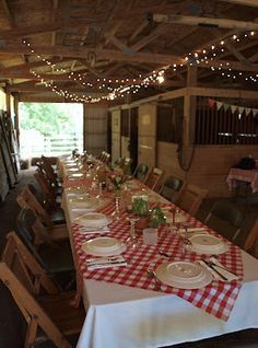 a long table set with plates and place settings