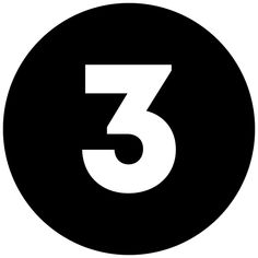 the number three in a black circle with white letters on it's bottom half