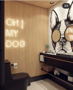 a bathroom with a dog on the wall