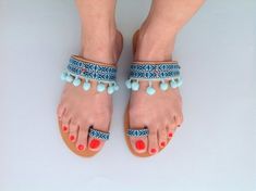 Boho Sandals, Ethnic Sandals, Hippie Sandals, Greek Sandals, Pom Pom Sandals, Party LookAmazing handmade boho leather sandals!!!Vivid summer colors are a mood booster!Blue is a summer color that make you dream on holidays and sea! It's the ideal pair of shoes when you can not carry many things with you because really matches any outfit and style!It's the perfect bohemian addition to your wardrobe!These light blue sandals are very easy to wear from office to drinks. It's perfect for the woman who Leather Tassel Sandals For Beach, Bohemian Open Toe Sandals For Summer, Bohemian Toe Post Sandals For Vacation, Bohemian Toe Post Sandals For Beach Season, Bohemian Multicolor Flip Flops For The Beach, Bohemian Flat Sandals For Beach, Blue Huarache Sandals For Spring Beach Outing, Blue Huarache Sandals For Beach In Spring, Bohemian Leather Barefoot Sandals For Summer