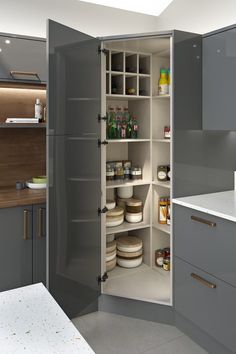 an open pantry in the middle of a kitchen