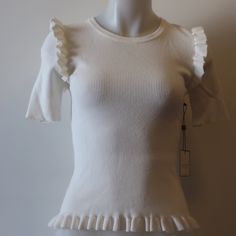 Nwt Womens Laundry By Shelli Segal Cream Ribbed Ruffle Short Sleeve Sweater S/P Material: 80% Viscose 20% Nylon Measurements (Flat): Armpits: 13" Length: 21" Shoulder: 13" New With Tags....232_ran_kat-1 Fitted Crew Neck Knit Top With Ruffles, Fitted Ruffle Crew Neck Knit Top, Fitted Ruffle Knit Top With Crew Neck, Fitted Cotton Knit Top With Ruffles, Fitted Cream Tops With Ruffles, White Ruffled Knit Top For Spring, Fitted Knit Top With Ruffles And Short Sleeves, Fitted Ruffle Knit Top With Short Sleeves, White Ruffled Knit Top For Summer