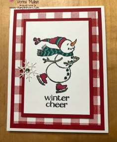 a card with a snowman on it that says winter cheer