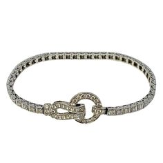 Simon G 18K White Gold Diamond Buckle 7.5" Bracelet (includes appraisal, Value: $11,000) Designer = Simon G Material = 18K Gold Gemstone = Diamond Condition = Good Class = Premier Location: Wilmette Item Number: 16904-99 Item ID: 297774 Category: Bracelet Designer Brilliant Cut Diamond Bracelet, Elegant Platinum Bracelets For Evening, Designer Diamond Bracelet With Brilliant Cut, Designer Bracelets With Brilliant Cut Diamonds, Designer White Gold Bracelet With Brilliant Cut, Designer White Gold Bracelets With Brilliant Cut, Designer Formal Jewelry With Single Cut Diamonds, Classic Evening Platinum Bracelets, Designer White Gold Diamond Bracelet For Formal Events