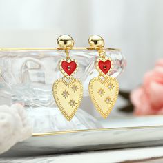 Our Heart-to-heart Earrings are a luxurious statement of love and affection. Crafted with care and skill, these ambitious earrings feature a vibrant heart-shaped design - perfect for a romantic evening or special occasion. Adorned with precious stones, these earrings truly capture the beauty of love. DETAILS Plating: 18K Gold Materials: 18K Gold on Brass, Cubic Zirconia Size: 0.79"*1.57"(20mm*40mm) Weight: 11.01g Unique Gift Wrapping, Heart To Heart, Love And Affection, Cat Ring, Bee Necklace, Bee Earrings, Sparkly Earrings, Romantic Evening, Cat Necklace