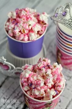 pink and white popcorn in small purple bowls