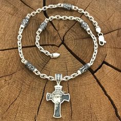 Silver set. 1️⃣ Silver anchor chain with 6 Orthodox inserts of the Faces of Saints ✔️Weight 70 grams ✔️Length 55 cm/ 21,65 inches ✔️Link width 5.5 mm ✔️Insert width 7.5 mm ✔️Inserts to choose from: 🔘Nicholas the Wonderworker 🔘Holy Trinity 🔘George the Victorious 🔘Holy Matrona 🔘Mother of God 🔘Panteleimon the healer 🔘Jesus Christ 🔘Sergius of Radonezh 2️⃣ Silver cross with the Face of Jesus ✔️Silver 925 blackening ✔️Weight 15 grams (+- 1 gram) ✔️Size 54/30 mm (including lug) ✔️Possible produ Silver Cross Necklace With Sterling Clasp, Silver Cross Necklace With Sterling Silver Clasp, Silver Cross Jewelry With Charms, Silver 925 Stamped Crucifix Jewelry, Symbolic Silver Cross Jewelry, Silver Cross Jewelry Symbolic Style, Silver Symbolic Cross Necklace As Gift, Silver Cross Jewelry With Symbolic Style, Sterling Silver Crucifix Necklace With Silver Chain