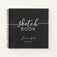 a black notebook with the words sketch book written in cursive writing on it