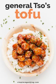 the cover of general tso's tofu is shown above rice and garnished with chives