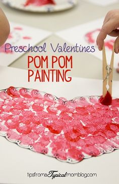 valentine's day bulletin board with pom pom painting