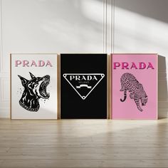 three canvases with different designs on them sitting in front of a white wall and wooden floor