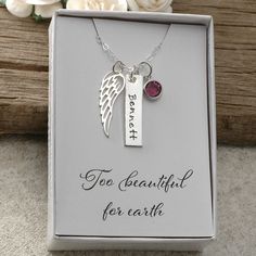 A sterling silver wing necklace with birthstone and personalized name rectangle. This comes in a gift box with a card that reads Too beautiful for earth. The wing charm measures 27mm x 8mm. Also included is a channel drop birthstone in your color choice. This comes with a 16, 18, or Sterling Silver Birthstone Necklace With Birth Flower For Gift, Silver Birthstone Necklace For Gift, Rectangular Keepsake Jewelry For Mother's Day, Sterling Silver Name Necklace For Keepsake, Silver Birthstone Necklace With Birth Flower For Gift, Rectangular Name Jewelry As A Gift, Rectangular Named Jewelry Gift, Rectangular Jewelry With Name For Gift, Rectangular Hand Stamped Jewelry Gift