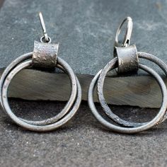 Unique Sterling Silver Hoop Earrings Gift, Unique Oxidized Sterling Silver Earrings, Oxidized Sterling Silver Drop Earrings, Nickel-free Sterling Silver Hoop Earrings For Anniversary, Elegant Round Hoop Earrings With Oxidized Finish, Minimalist Circle Earrings For Anniversary, Nickel Free Open Circle Metal Earrings, Nickel-free Metal Earrings With Open Circle Design, Nickel-free Open Circle Metal Earrings