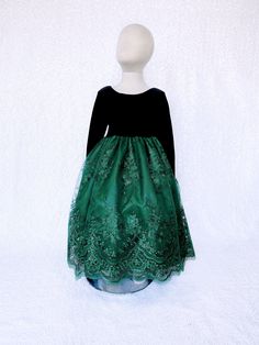 A gorgeous dress that can be worn for a Christmas party, birthday, photoshoot, or pageant! Long sleeve bodice is made out of soft velvet. The zipper can be found on the back of the dress. Comes with a detachable embroidery bow. The skirt is made out of a detailed embroidery fabric with lining underneath. One last layer of lining with crinoline attached underneath everything to give the dress shape. *Mannequin has petticoat to show detail. !PETTICOAT NOT INCLUDED! LINK TO PURCHASE PETTICOAT: http Emerald Green Dress Long, Long Sleeve Black Gown, Embroidery Bow, Formal Chic, Newborn Flower, Blush Gown, Party Photoshoot, Long Sleeve Velvet Dress, Green Embroidery