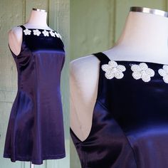 a purple dress with white flowers on it