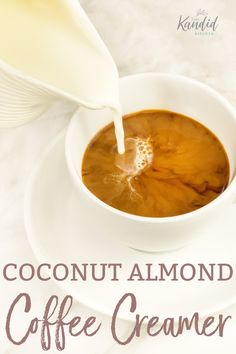 a cup of coffee with milk being poured into it and the words coconut almond coffee creamer