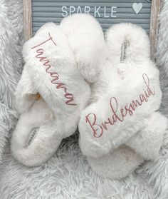 a white teddy bear with the word bridesmaid written on it