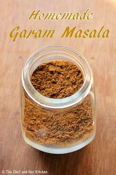 homemade gran masala in a glass jar on a wooden table with text overlay