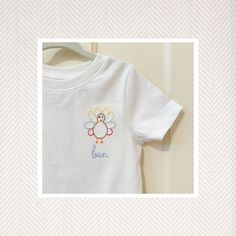 Make your children the talk of the town with this Hand Embroidered t-shirt! Perfect for Fall days, Thanksgiving parties, Fall parties, school, play or out and about! We love these paired with a pair of green gingham bloomers or shorts! For local Columbus, Georgia pickup use code LOCALPICKUP to wave shipping fees. You must be able to do porch pickup once item is completed. These shirts are 100% cotton and run true to size, but I normally size up for longer wear! Thanksgiving Hand Embroidery, Gingham Bloomers, Hand Stitch Embroidery, Fall Parties, Columbus Georgia, Turkey Shirts, Green Gingham, Hand Stitch, Turkey Day