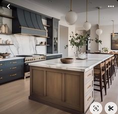 a large kitchen with marble counter tops and wooden cabinets is shown in this image, there are many chairs around the island