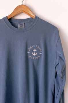 AHOY! For all my waterside loving, nautical friends! Wear this nautical design on a cool morning at the dock, your favorite lake, at the beach, or your favorite waterside escape! Embroidered on your choice of a Comfort Colors tee, long sleeve, crewneck sweatshirt, or quarter zip. Comfort Colors is unisex sized. This means the sizing is boxy, not fitted like women's, but it is not oversized. It is true to size. Tee Specifications: 6.1 oz., 100% ring spun cotton Soft-washed garment-dyed fabric Dou Nautical Cotton Crew Neck Top, Cheap Nautical Style Crew Neck T-shirt, Nautical White Crew Neck T-shirt, Summer Crew Neck T-shirt For Boating, Yellow Crewneck, Blue Nautical Crew Neck T-shirt, Friends Sweatshirt, Embroidered Tee, Nautical Design