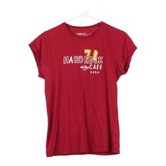 Vintage red Dubai Hard Rock Cafe T-Shirt - womens x-large 90s Style Red T-shirt With Text Print, Vintage Red T-shirt With Text Print, 90s Red T-shirt With Text Print, Cheap University Red Cotton T-shirt, Red Hip Hop Cotton T-shirt, Bohemian Red Cotton T-shirt, Vintage Hard Rock Cafe Sweatshirt, Red Organic Cotton Casual T-shirt, Rock Cafe