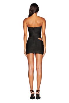 Details Best selling Flavia Dress in new black colourway Black bandage style dress Mini length and bodycon silhouette Strapless neckline Featuring deconstructed strapping detail at waist and hem Cutout detail throughout Zipper at centre back Unlined - This fabric is not sheer We recommend wearing a strapless bra, no bra or pasties with this garment Recommended Underwear: Due to the cutout detail, we recommend wearing this garment with a seamless low-brief Size and Fit True to size. We recommend Black Mini Bandage Dress For Cocktail, Black Mini Bandage Dress For Club, Black Bodycon Dress With Boning, Cutout Mini Length Bandage Dress For Party, Chic Black Mini Bandage Dress, Strapless Bandage Mini Dress For Night Out, Strapless Bandage Mini Dress For Date Night, Strapless Bandage Dress For Date Night, Black Fitted Strapless Bandage Dress