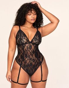 The Clarisse lace bodysuit is beautiful, bold, and unapologetically sexy. With all-lace paneling, unlined triangle cups, and a dramatic elastic lace-up back feature, this bodysuit is perfect for a special night in. (Available in plus-sizes XL-4X.) Stretch Lace Backless Bodysuit, Sheer Lace Bodysuit For Night Out, Lace Bodysuit With Lace Closure For Party, Party Lace Bodysuit With Lace Closure, Backless Lace Trim Bodysuit For Night Out, Backless Lace Bodysuit With Lined Body, Lace Bodysuit With Lined Body For Night Out, Lace Backless Bodysuit With Lined Body, Fitted Lace Backless Bodysuit