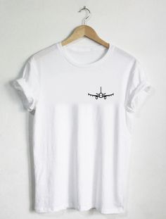 AIRPLANE All tees are handmade in my studio in Los Angeles, California, USA. Please refer to image pictures in listing for size and color charts. Tees are made with preshrunk 100% ringspun cotton (heather grey comes in a cotton/poly blend), are super soft, & design is INK TO GARMENT. Tees can withstand many washes in all wash temperatures and drying levels. We have larger sizes available if needed beyond XXL as well as other shirt colors available, just message us and we can accommodate you White Print Crew Neck Shirt With Logo, Casual Crew Shirt, Pre-shrunk, Casual Pre-shrunk Crew Shirt, Casual Crew Shirt With Letter Print, Casual Crew Neck Shirt With Letter Print, White Print Crew Neck Shirt With Front Print, White Printed Crew Neck Shirt With Front Print, Pre-shrunk White Print Crew Neck Shirt, Casual White Cotton Transfers