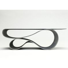 a table that has some kind of curved design on it