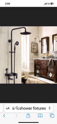 a bathroom with a sink, mirror and shower faucet next to a window