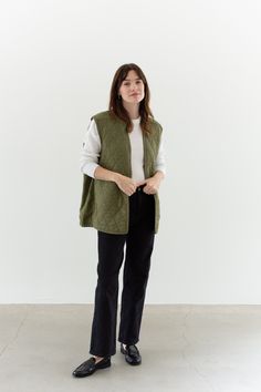 "Quilted liner Vest in Olive Green. Diamond Quilting pattern. Open front, no closure. Maker: British Military |  Material: Cotton Condition: Great! with a few faded white marks.  LARGE: Shoulders: 17\"  |  Chest: 23.5\"  |  Length: 28\"  Cassie is 5'8\" and wears a modern small. This could fit a larger frame. SHOP http://www.rawsonstudio.etsy.com FOLLOW US + instagram | @_rawson + pinterest | rawson *No Returns. Items are eligible for store credit only. We ask that the buyer ship to provided address and a credit code is issued for one year.*" Unisex Winter Outfits, Olive Green Quilted Jacket Outfit, Olive Quilted Jacket Outfit, Versatile Cotton Vest For Layering, Sleeveless Khaki Outerwear For Layering, Casual Sleeveless Everyday Outerwear, Everyday Cotton Vest Outerwear, Green Vest Outerwear For Layering, Green Layering Vest Outerwear