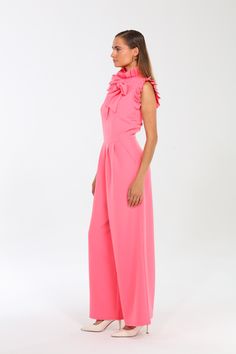 Crafted from a luxurious blend of 90% polyester and 10% spandex, the Tied to You Ruffle Jumpsuit offers a perfect balance of softness and stretch. Designed with a relaxed yet tailored fit, this jumpsuit drapes beautifully over the body, providing all-day comfort without sacrificing style. The stretchy material ensures it fits snugly at the right places while allowing freedom of movement, making it an ideal choice for both active days and leisurely outings. This jumpsuit stands out with its uniqu Ruffle Jumpsuit, Top Dress, The Body, Stretchy Material, Best Sellers, Royal Blue, Jumpsuit, Spandex, Dresses