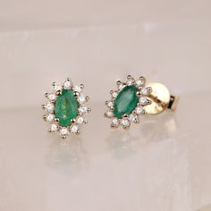 "Natural Emerald and Diamond Earrings / 14k Solid Gold / Emerald Earrings / Gold Stud Earrings / Make a Set with Necklace and Ring / Genuine ✔ Handmade ✔ Diamond Ct Weight: 0.24ctw ✔ Emerald Ct Weight: 0.46 All our emeralds are treated natural emeralds (Emeralds are typically treated with oil or other \"fillers\" to draw the filling substance into any surface-reaching fissures to improve the clarity of the emerald) ✔ Setting Dimension: 7mmx9mm ✔ Solid Gold ✔ Natural Diamonds and Natural Emerald Green Teardrop Diamond Earrings Fine Jewelry, Green Teardrop Diamond Earrings, Green Diamond Drop Earrings With Prong Setting, Green Diamond Earrings For Anniversary, Elegant Green Diamond Cluster Earrings, Fine Jewelry Emerald Pear-shaped Earrings, Green Teardrop Diamond Earrings For Anniversary, Pear-shaped Emerald Earrings Fine Jewelry, Green Fine Jewelry Cluster Earrings For Formal Events