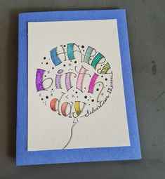 a card with the words happy birthday written on it and a balloon in the middle