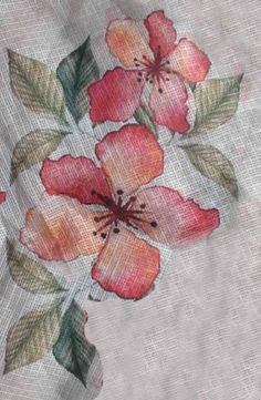 an image of flowers painted on fabric