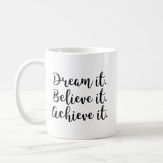 a white coffee mug with the words dream it believe it achieve it