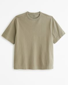 Classic short-sleeve tee in our heavyweight softAF 275g fabric and oversized-fit silhouette, featuring back seaming detail and ribbed detail at crew neckline. Dad Outfits, Olive Green T Shirt, T Dress, American Clothing, Men's Tops, Suits Coats, Basic Tee, Athletic Fits, Modern Man